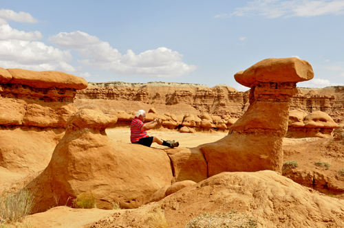 Lee Duquette rides a camel at Goblin Valley State Park